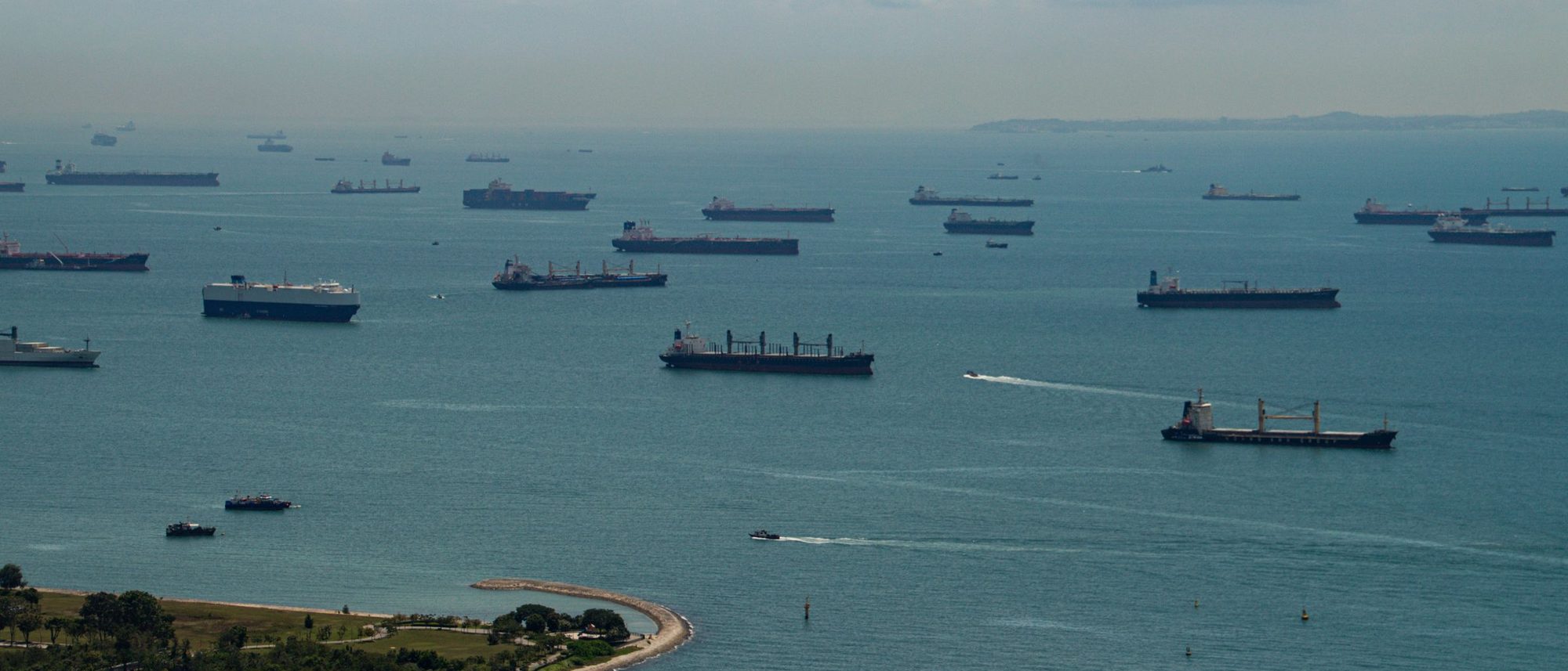 Ships at anchor in the Singapore Strait seen from the air.
