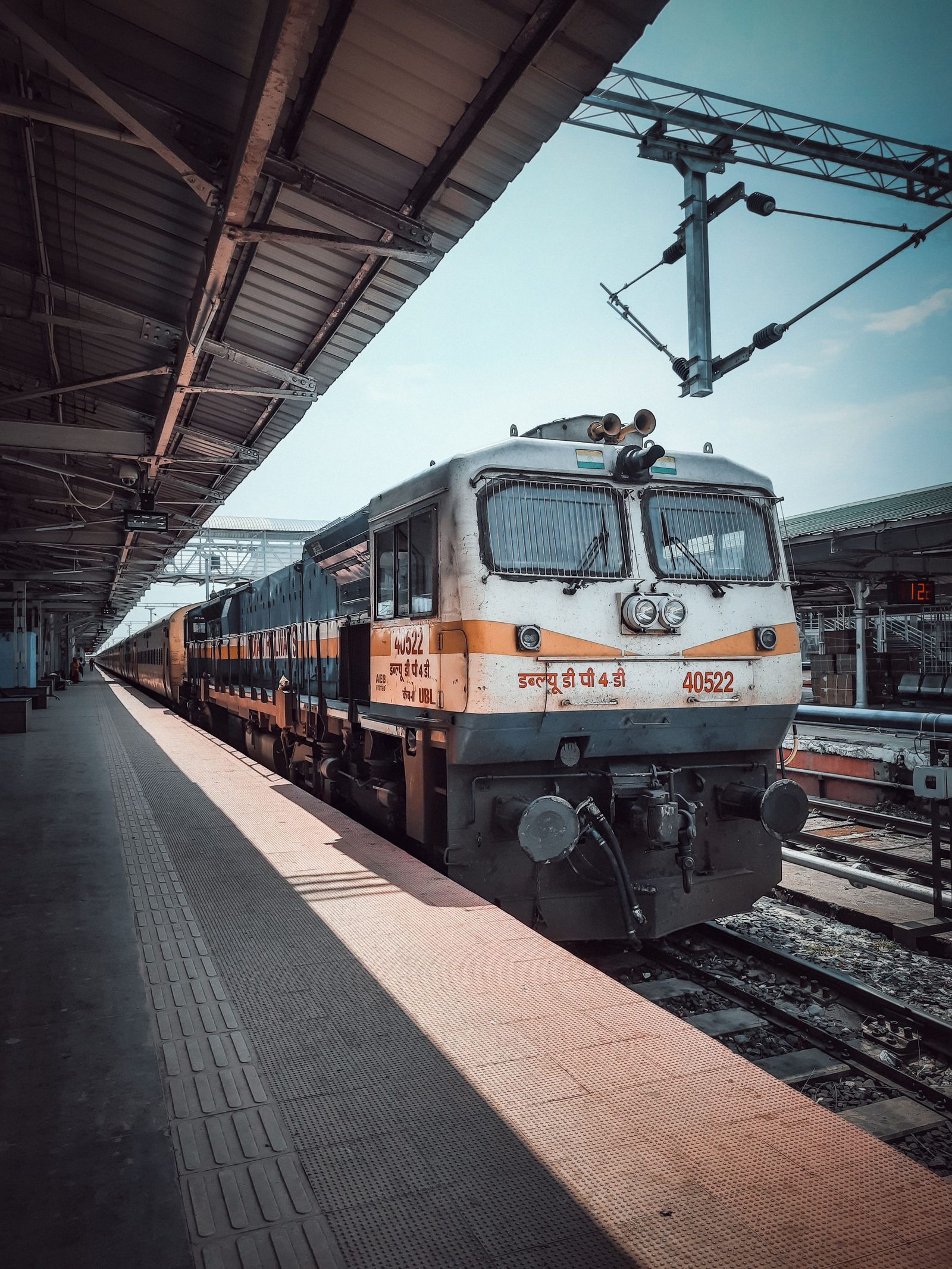 A passenger train stands at a platform at Hubli station in Karnataka.