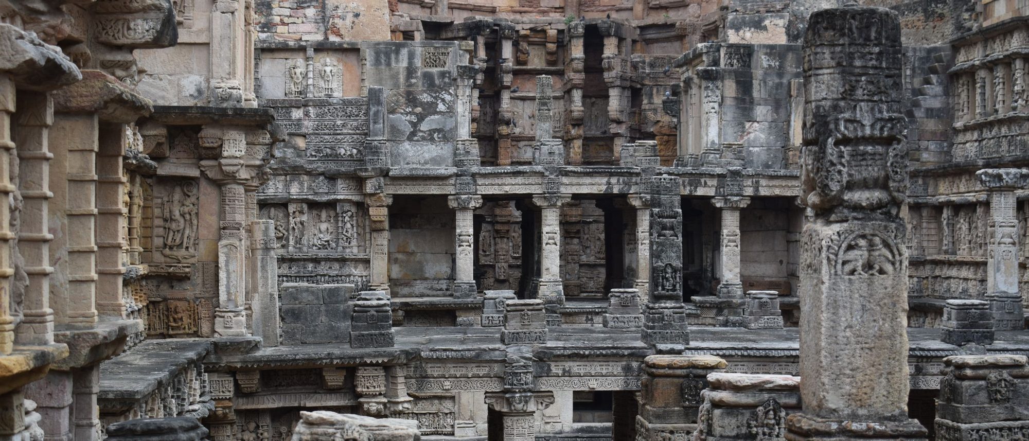 Carved stone galleries descend level by level inside Rani ki Vav stepwell in Patan.