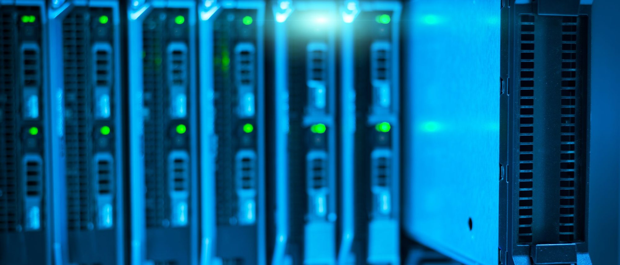 A close view of a server rack with rows of hardware and indicator lights.